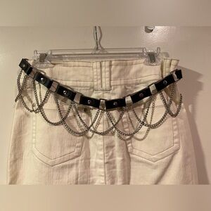 Leather (could be faux leather) with chain belt - excellent condition